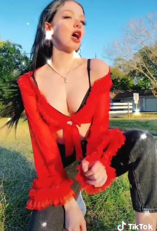 3. Captivating candyasmus Shows Cleavage in Red Crop Top