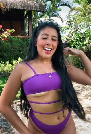 Erotic Cinthia Cruz in Violet Swimsuit (Underboob)