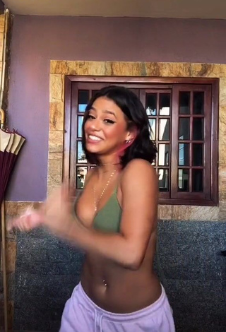 1. Beautiful Maria Clara Garcia Shows Cleavage in Sexy Olive Bikini Top and Bouncing Boobs