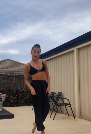 1. Erotic Caitlin Cummins in Black Sport Bra