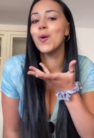 Pretty Carla Flila Shows Cleavage in Blue Crop Top