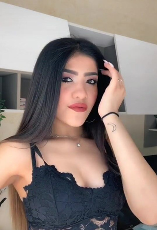 Captivating Cassandra Tejada Shows Cleavage in Black Crop Top