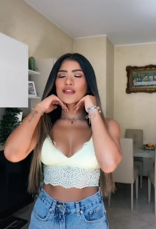 Cute Cassandra Tejada Shows Cleavage in White Crop Top