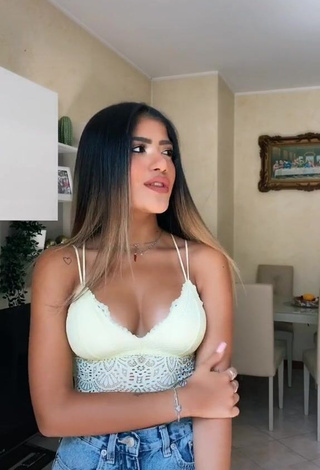 3. Cute Cassandra Tejada Shows Cleavage in White Crop Top