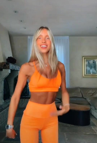 1. Captivating Morel Chekoral in Orange Crop Top