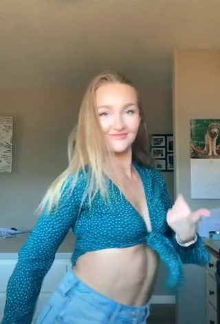 Captivating Bailey McManus Shows Cleavage in Turquoise Crop Top