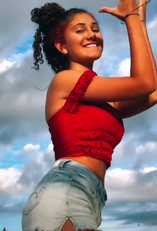 Irresistible Isabela Shows Cleavage in Red Crop Top