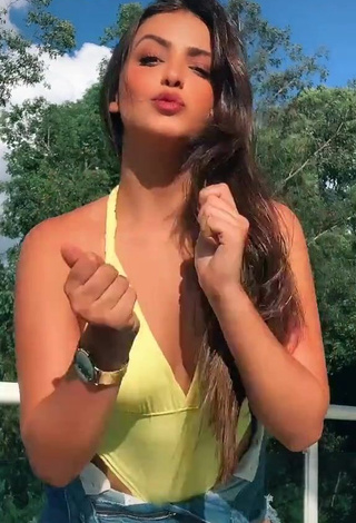 1. Captivating Isa Pinheiro Shows Cleavage in Yellow Swimsuit