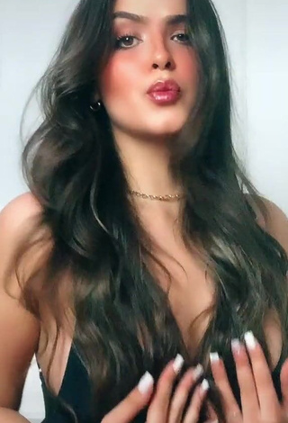 1. Erotic Isa Pinheiro Shows Cleavage in Black Top (Side Boob)