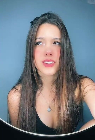 Erotic Justina Castro Shows Cleavage