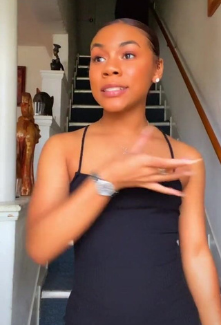 1. Erotic Kristen Ware Shows Cleavage in Black Dress