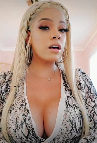 Erotic Lainsuperable Shows Cleavage in Snake Print Dress (Side Boob)