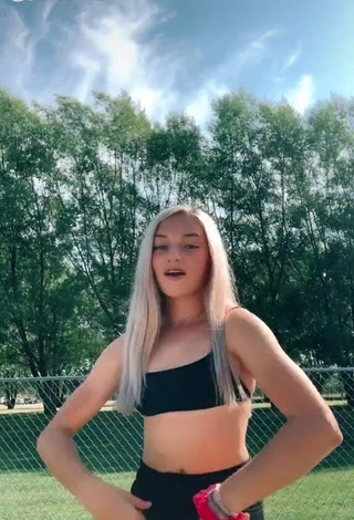 1. Captivating Lexi Schwab Shows Cleavage in Black Crop Top