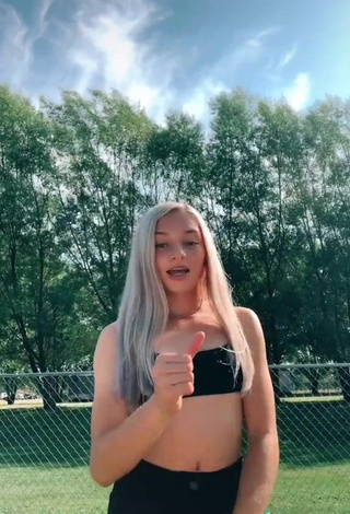 Captivating Lexi Schwab Shows Cleavage in Black Crop Top