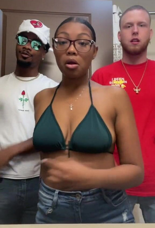 3. Hottie Destinyy Shows Cleavage in Green Bikini Top