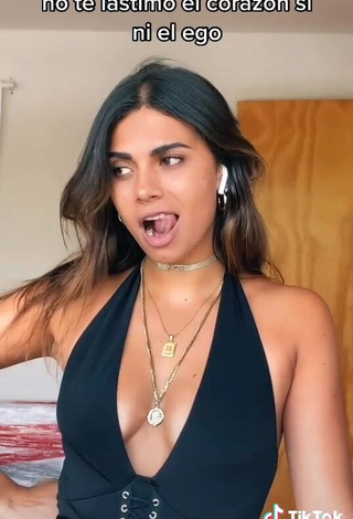 3. Irresistible Manu Barrios Shows Cleavage in Black Top