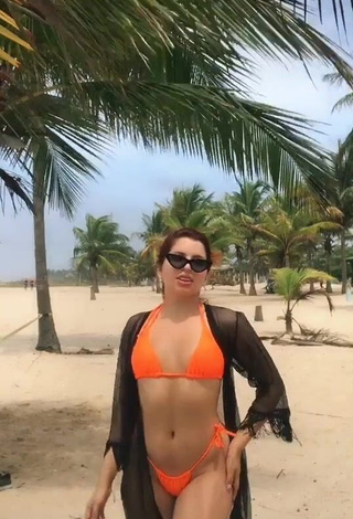 1. Erotic Marian in Orange Bikini at the Beach