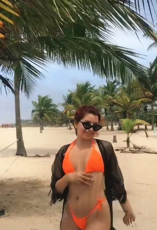 3. Erotic Marian in Orange Bikini at the Beach