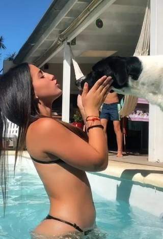 Hottie Martina Catini Shows Cleavage in Black Bikini at the Swimming Pool