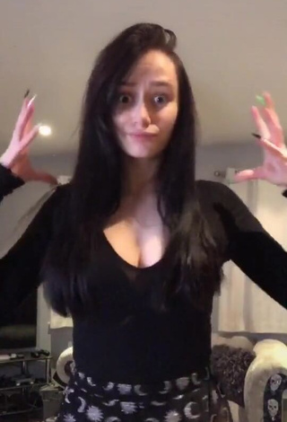 Captivating Georgie Rubery Shows Cleavage in Black Top