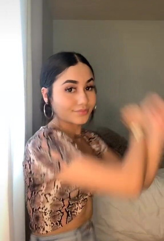 Irresistible Iya Madrid Shows Cleavage in Snake Print Crop Top (Side Boob)