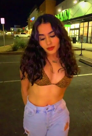 1. Irresistible Iya Madrid Shows Cleavage in Leopard Bikini Top