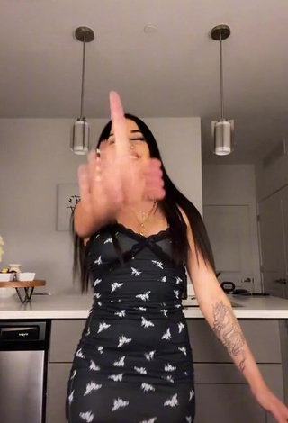 Erotic Iya Madrid Shows Cleavage in Dress