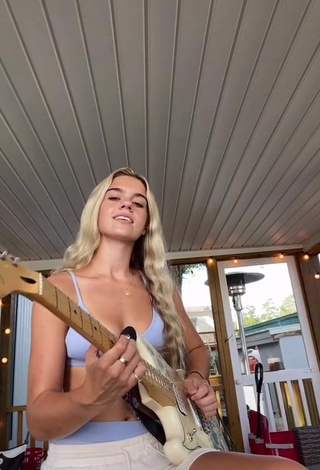 Irresistible Morgan Shows Cleavage in Bikini Top