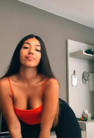 Erotic Noa Planas Shows Cleavage in Red Top