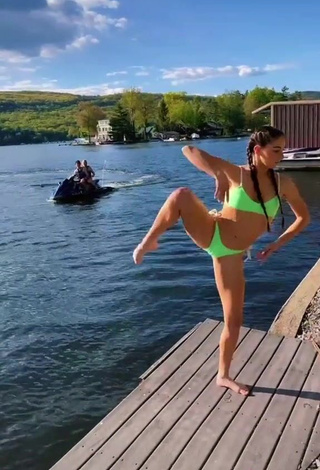 3. Erotic Olivia Alboher Shows Cleavage in Light Green Bikini