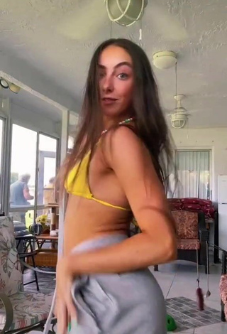 3. Irresistible Olivia Alboher Shows Cleavage in Yellow Bikini Top