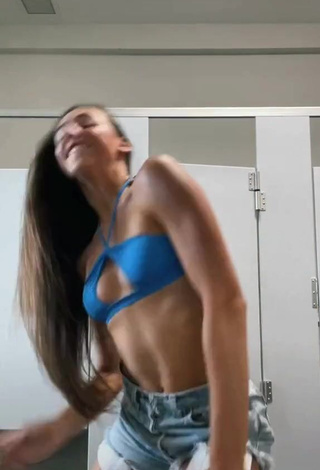 3. Erotic Olivia Alboher Shows Cleavage in Blue Bikini Top (Side Boob)