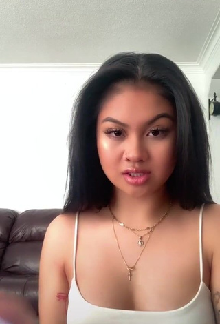 1. Captivating Carly Sarah Shows Cleavage in White Crop Top