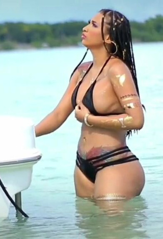 1. Irresistible Aliany García in Black Bikini in the Sea (Side Boob)