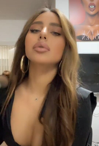 3. Erotic Aline Cohen Shows Cleavage in Black Dress