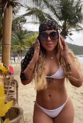 1. Captivating Chantall Pizzino Shows Cleavage in White Bikini at the Beach