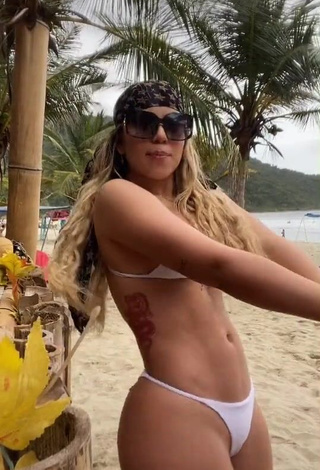 3. Captivating Chantall Pizzino Shows Cleavage in White Bikini at the Beach