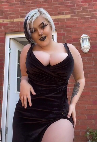 Irresistible Hollymarie Shows Cleavage in Black Dress