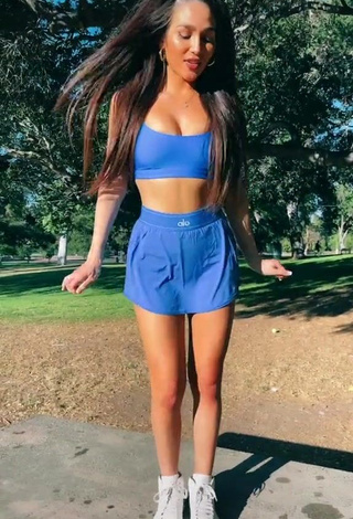 Hot Iris Shows Cleavage in Blue Crop Top