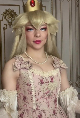 1. Irresistible Ken Shows Cleavage in Dress