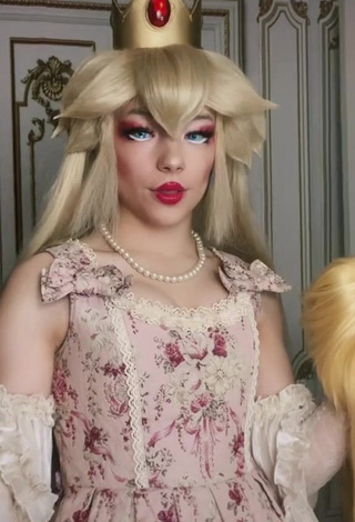 Irresistible Ken Shows Cleavage in Dress