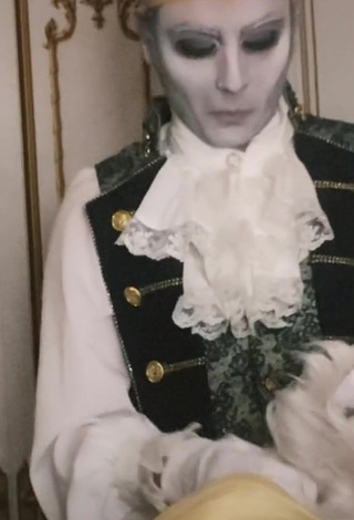 3. Irresistible Ken Shows Cleavage in Dress