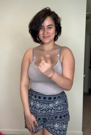 Erotic Nalinaty Shows Cleavage in Dress
