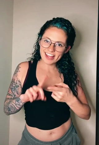 1. Erotic Tabatha Marie Shows Cleavage in Black Tank Top