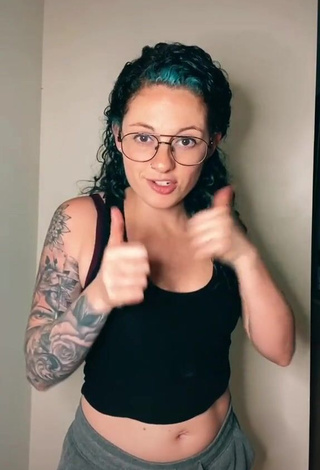 3. Erotic Tabatha Marie Shows Cleavage in Black Tank Top