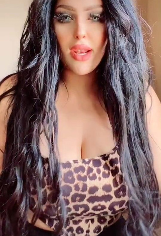 Erotic Salma Elshimy Shows Cleavage in Leopard Crop Top