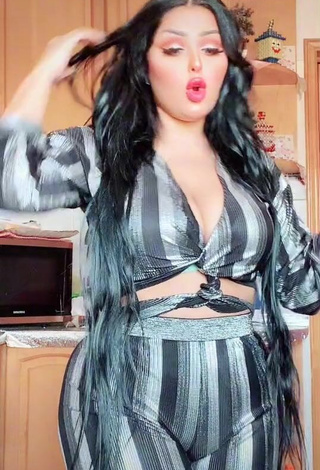 Erotic Salma Elshimy Shows Cleavage in Bodysuit