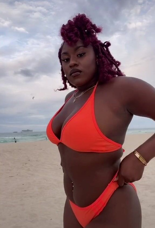 Cute Skaibeauty Shows Cleavage in Electric Orange Bikini at the Beach