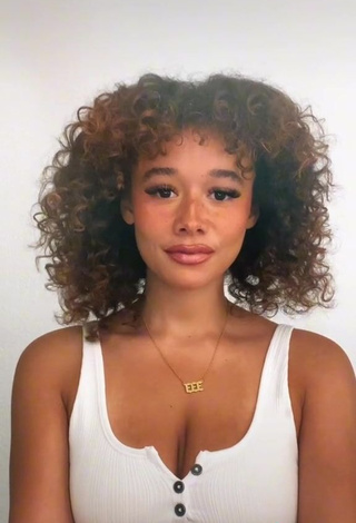 3. Irresistible Talia Jackson Shows Cleavage in White Crop Top