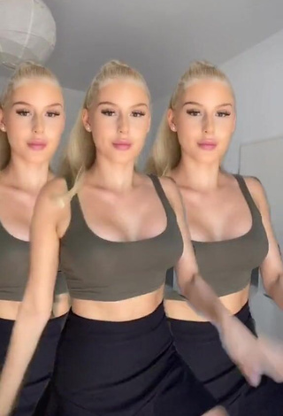 Antonia Rot Shows Hot Green Crop Top and Cleavage